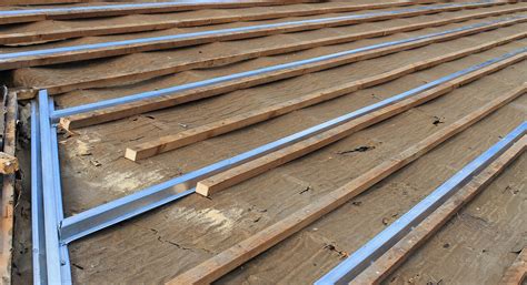 using house wrap under metal roof over perlins|steel roofing over purlins.